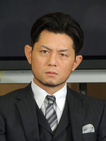 的場浩司さん（2013年7月撮影、時事）